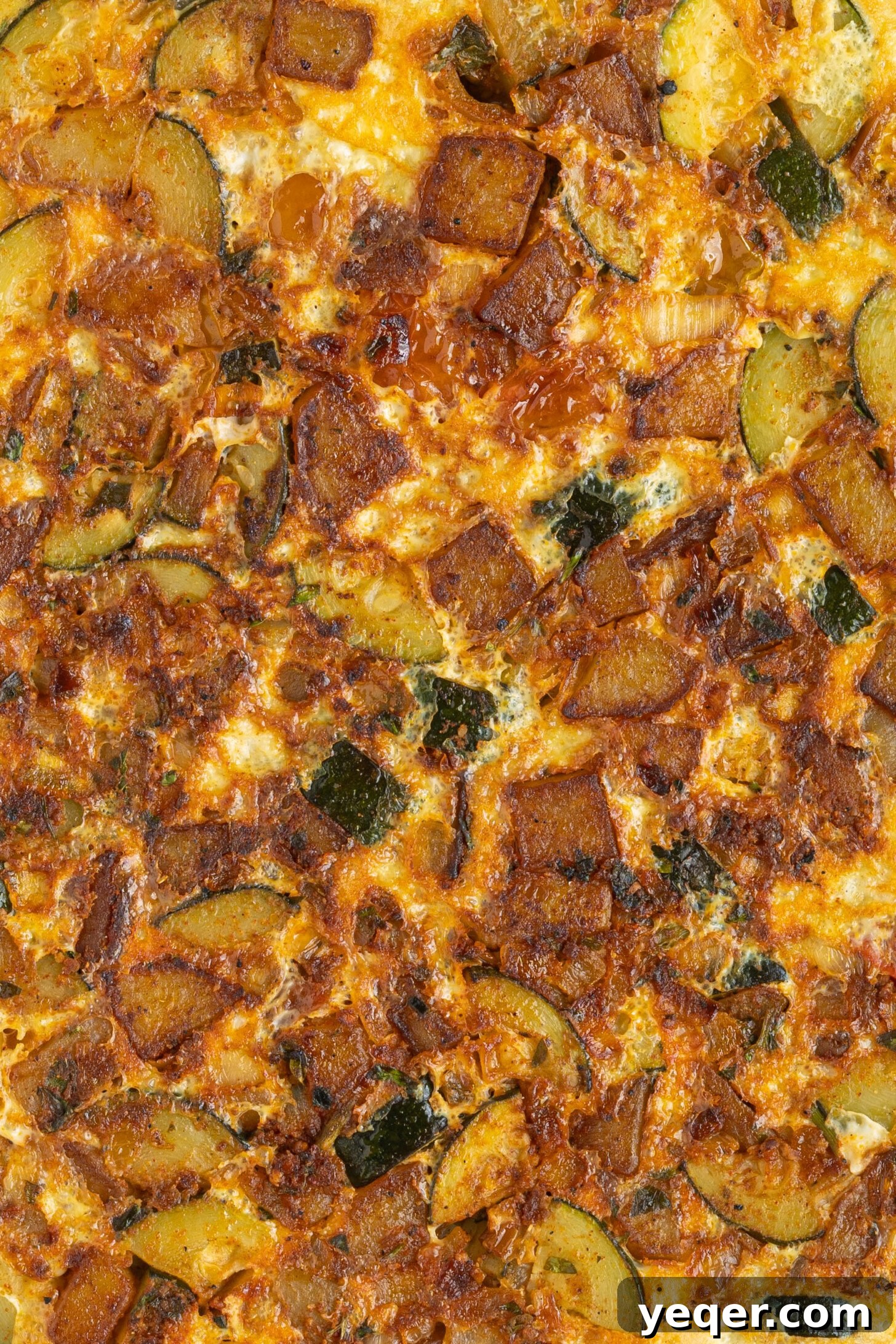 Moroccan Golden Potato Frittata 13 a vibrant potato omelette garnished with fresh herbs, ready to be enjoyed
