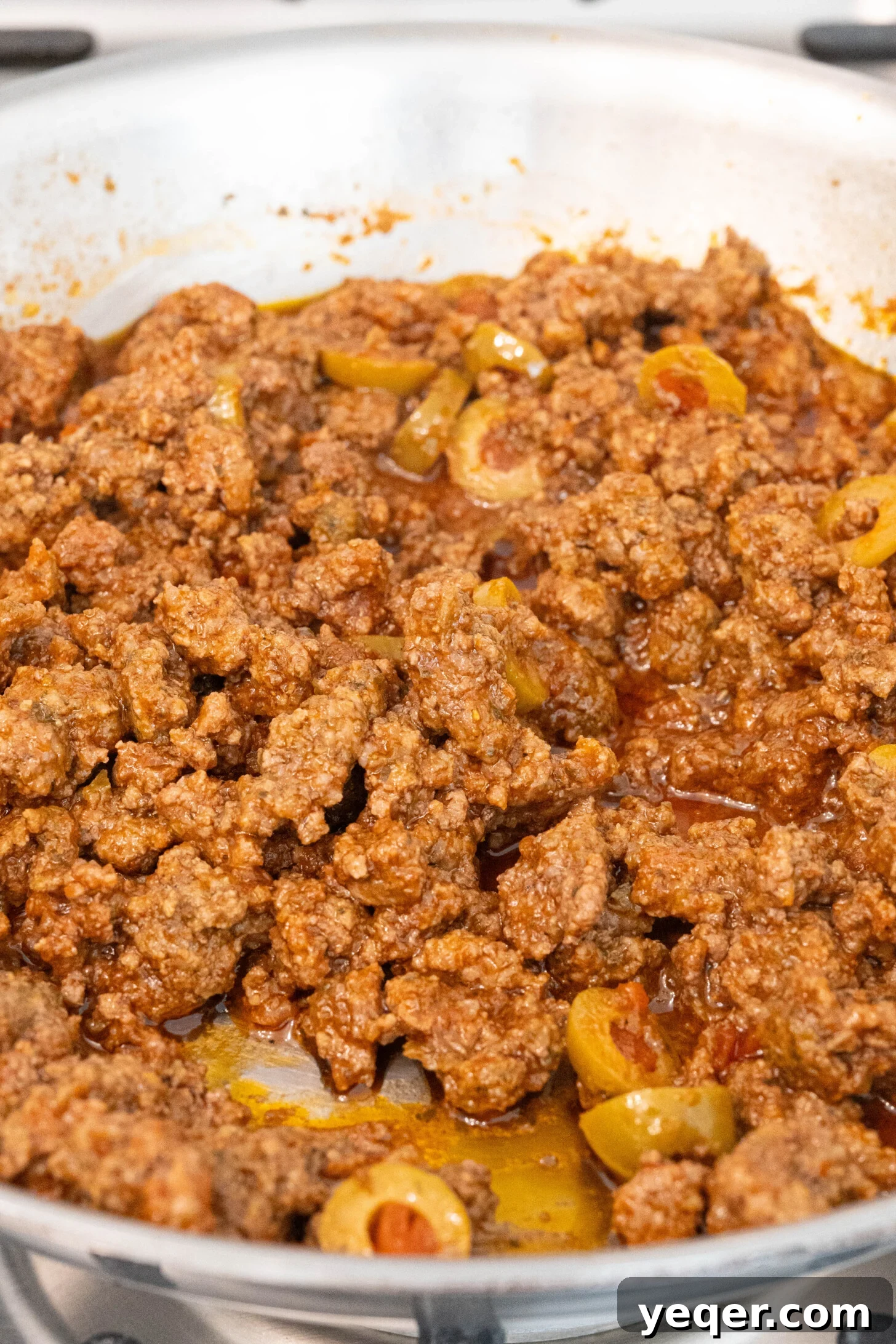 Puerto Rican Stuffed Plantain Cups 4 Ground beef and sofrito cooking in a pan.