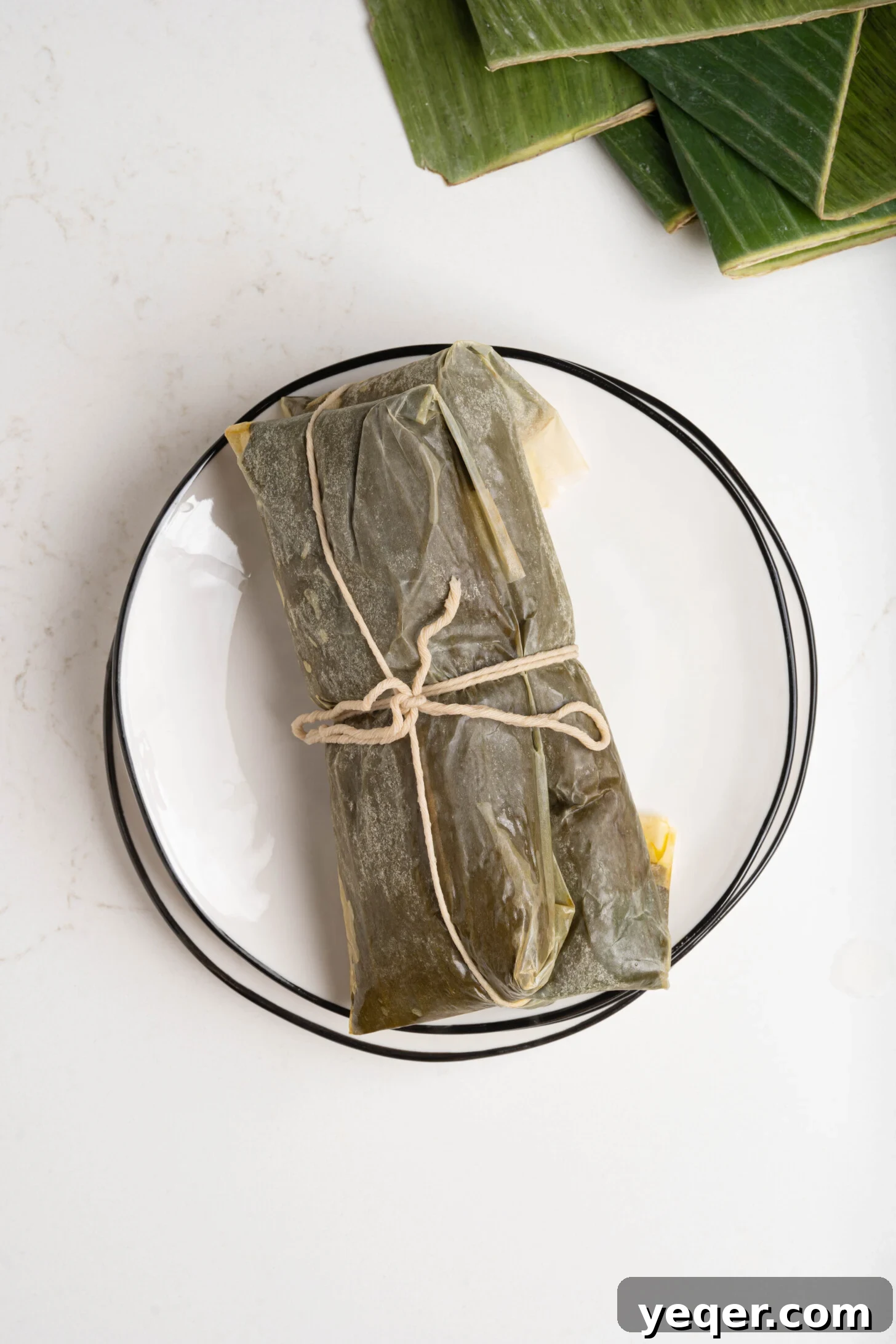 Puerto Rican Pasteles: Savory Meat-Stuffed Masa Delights 21 A close-up of a Puerto Rican pastel, cut open to reveal the delicious meat filling and masa.