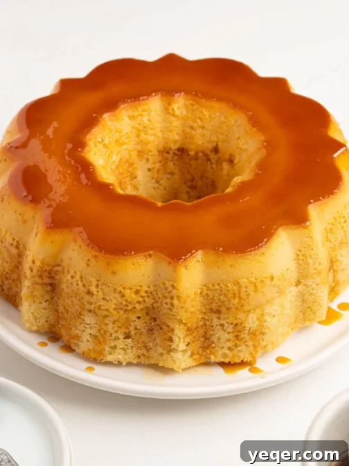 Puerto Rican-Style Flancocho (Vanilla Flan Cake) on a white plate