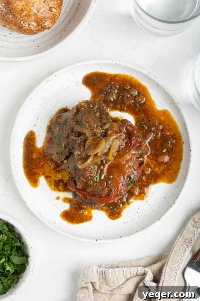 Rich Moroccan Beef Tagine with Tomatoes and Onions 13 a Moroccan beef tagine on a plate
