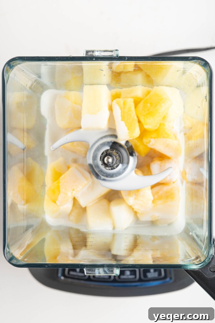 Speedy Piña Colada Morning Escape 6 a smoothie with frozen pineapple and coconut milk