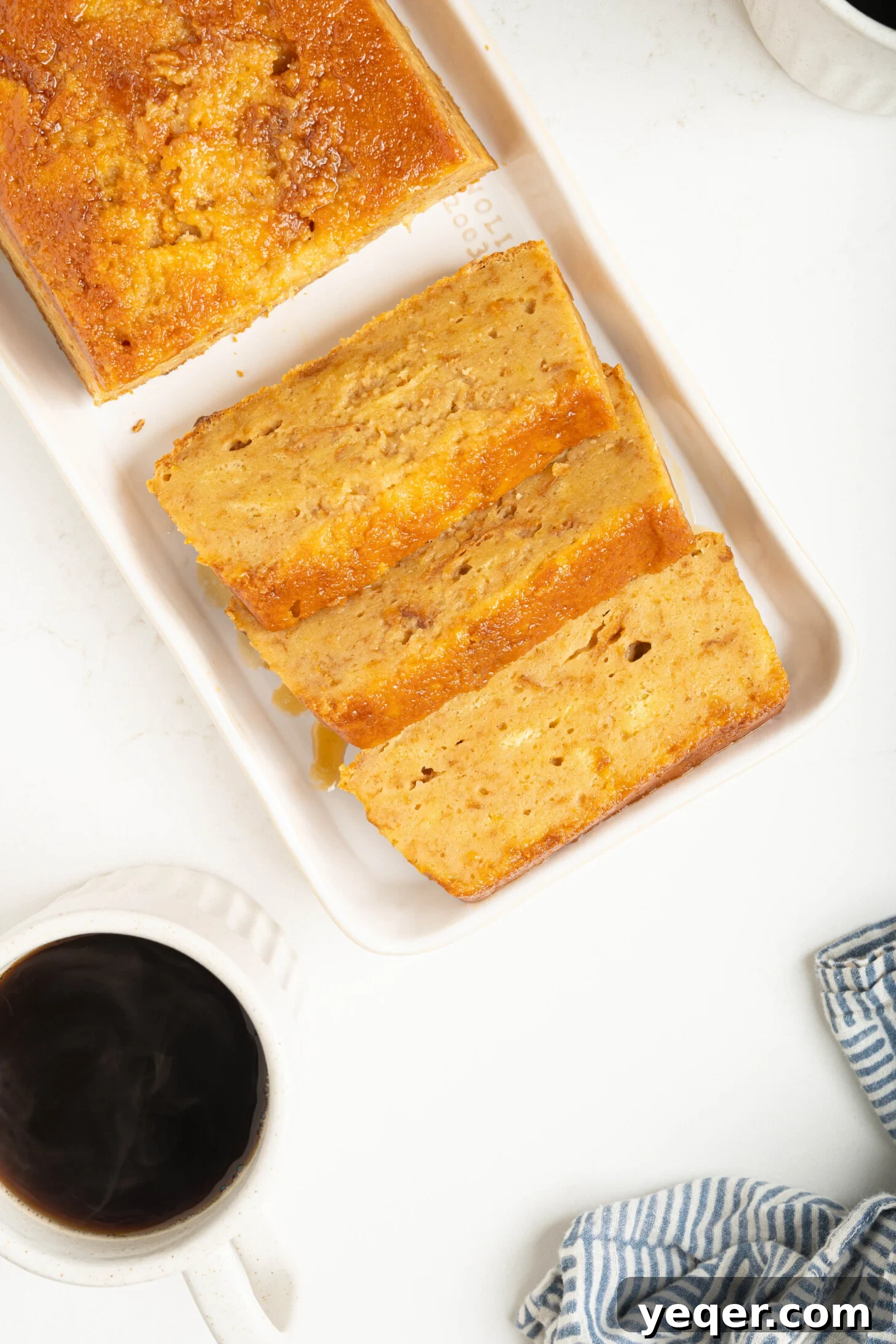 Puerto Rican Baked Bread Pudding 14 A slice of Puerto Rican Budin paired with a cup of coffee, creating a perfect dessert and beverage moment.