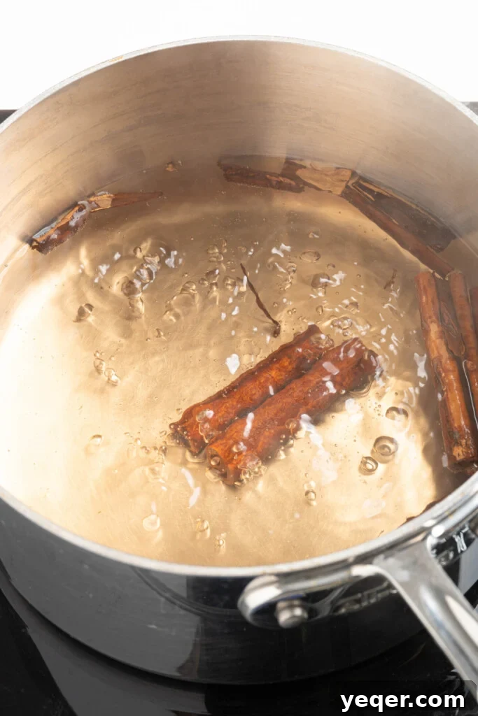 Aromatic Cinnamon Homebrew 4 Cinnamon sticks boiling with water.