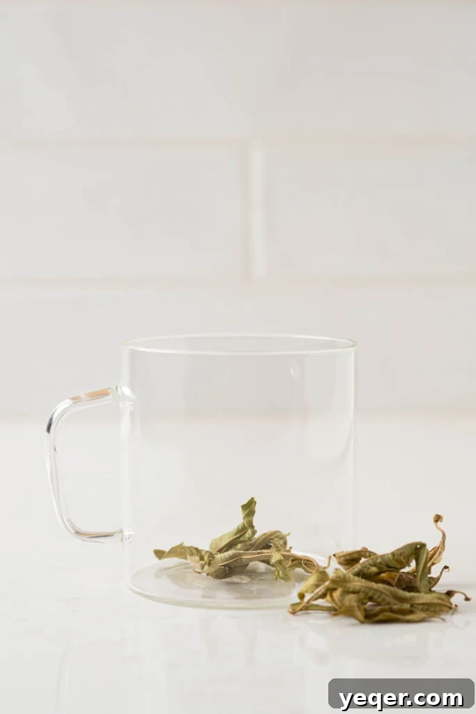 Invigorating Lemon Verbena Tea in 15 Minutes 3 A close-up of dried lemon verbena leaves ready for brewing, highlighting their texture and potential for a fragrant tea.
