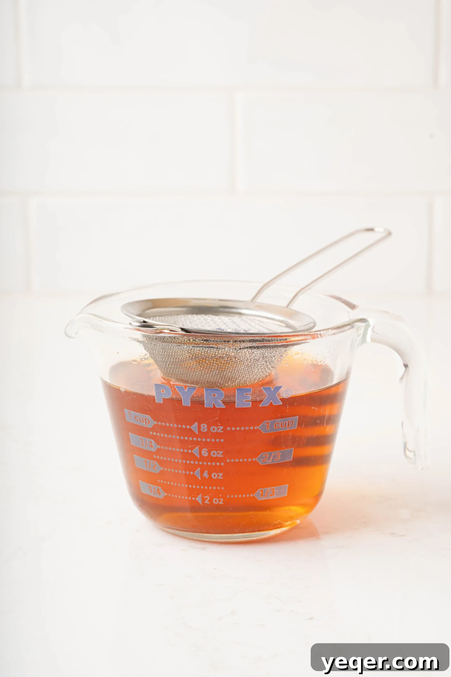 15-Minute Zesty Turmeric Brew 7 strained turmeric tea