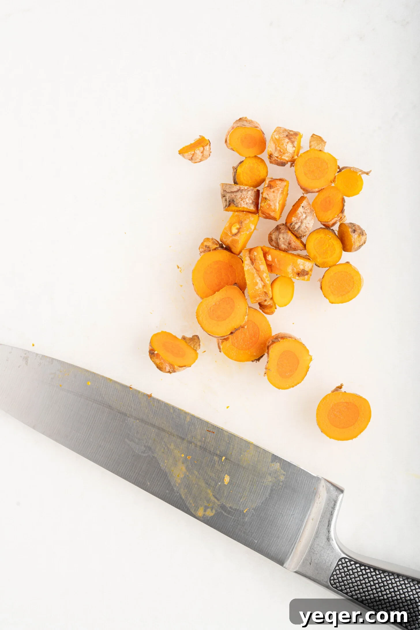 15-Minute Zesty Turmeric Brew 8 chopped turmeric on a cutting board