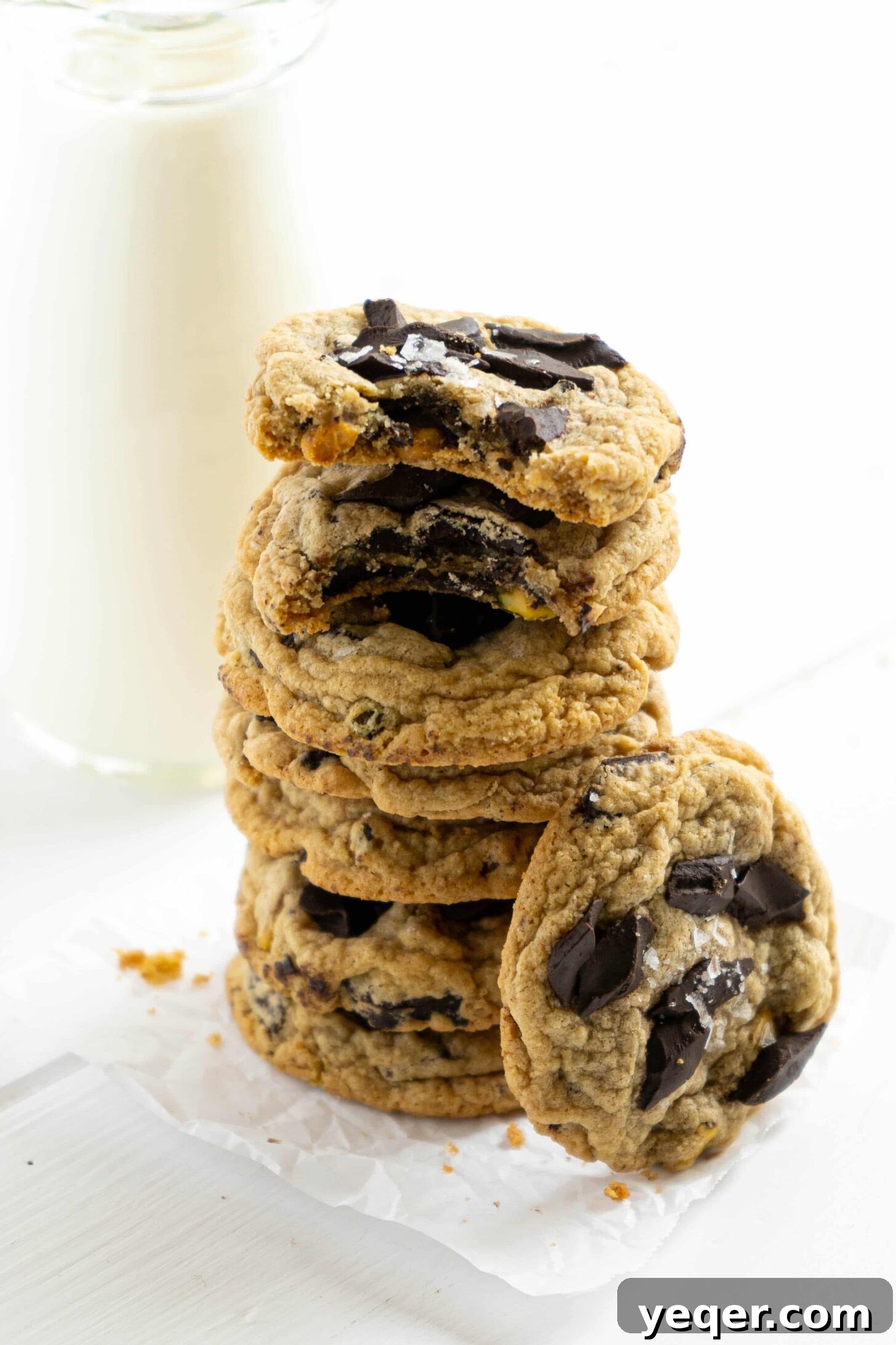 Gluten Free Chocolate Chip Cookie Perfection 4 A stack of Gluten Free Chocolate Chip Cookies with a bite taken out of two.
