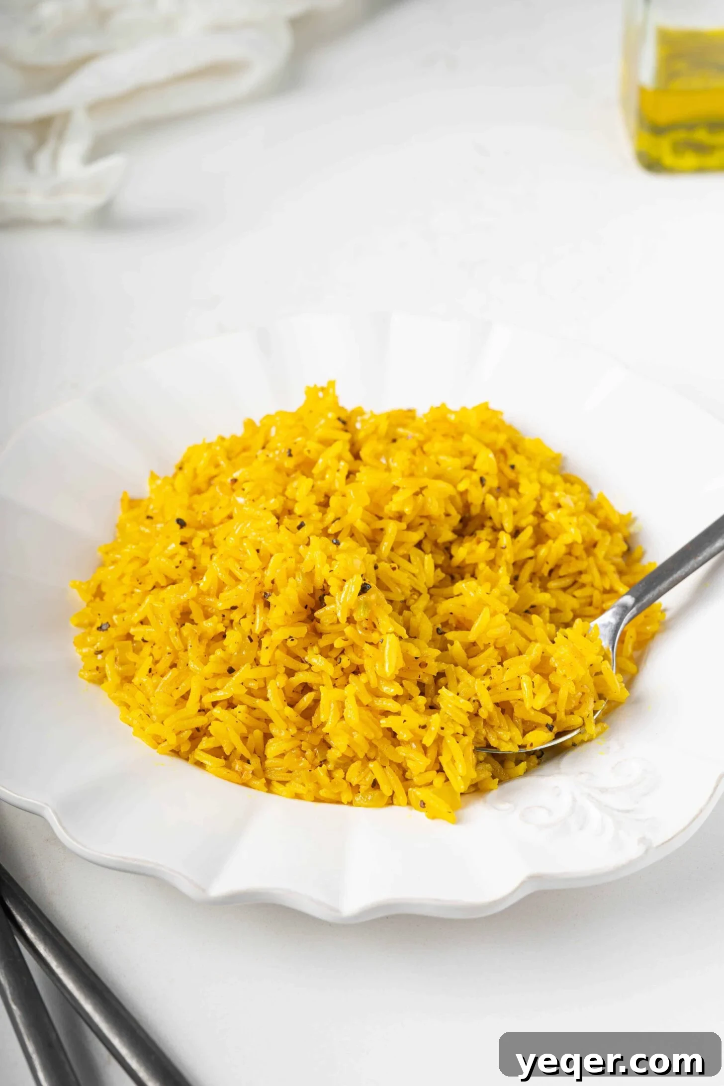 Golden Fluffy Turmeric Basmati Rice 8 turmeric basmati rice on a plate