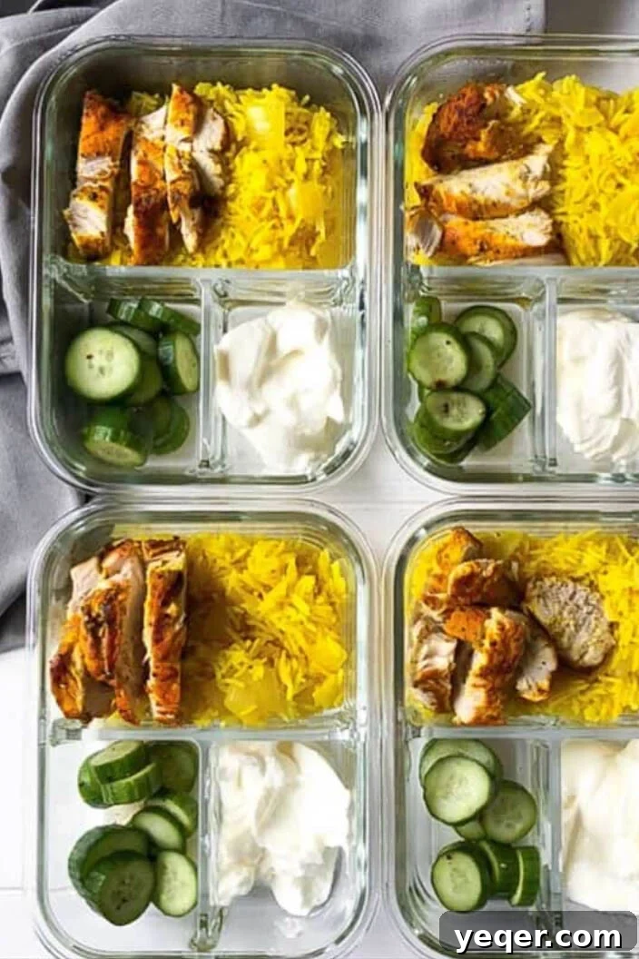 bowls of turmeric rice with turmeric chicken