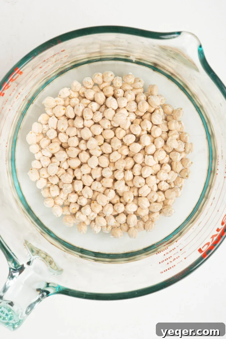The Foolproof Soak and Boil Method for Perfect Dried Chickpeas 4 a bowl of dried chickpeas with water