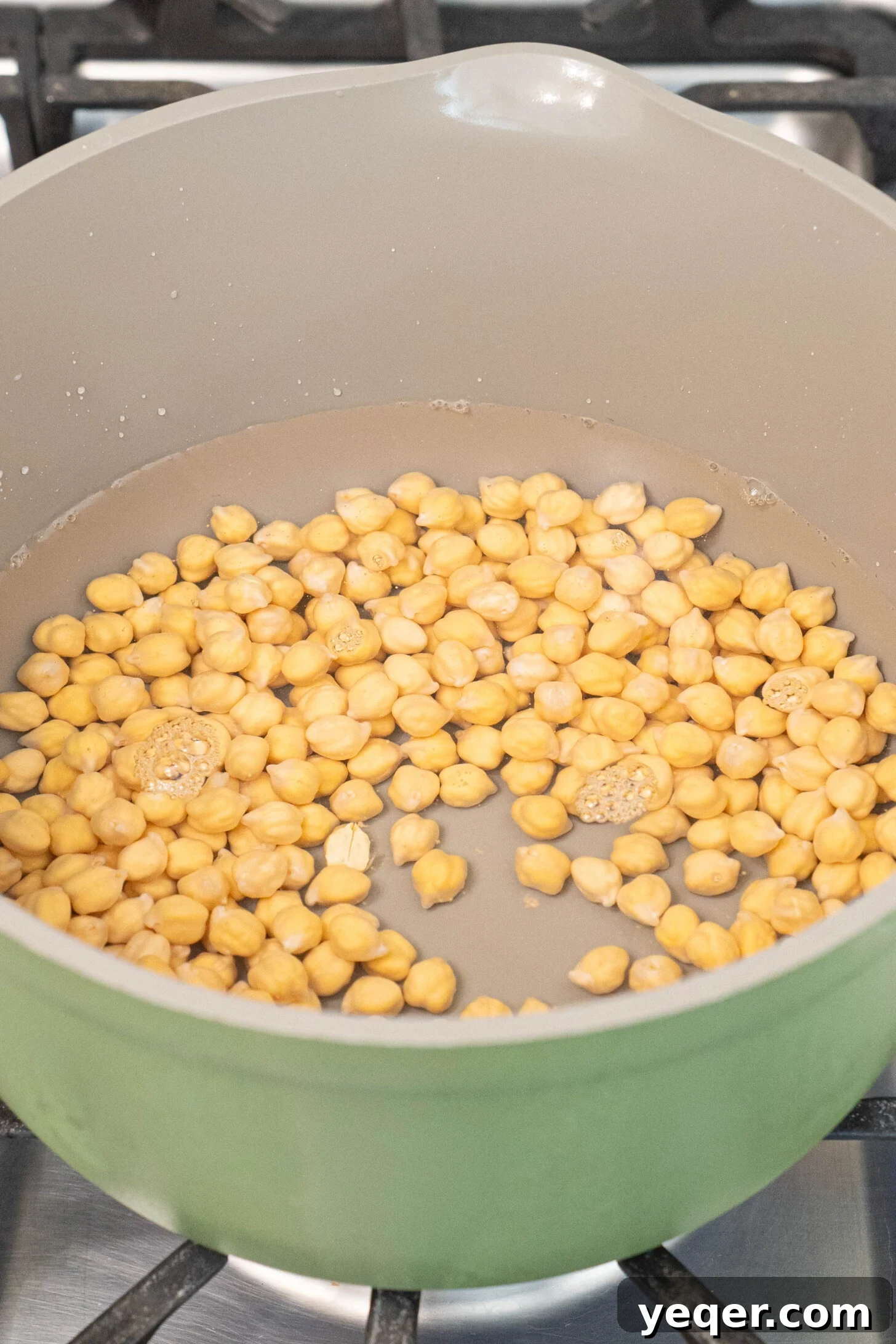 The Foolproof Soak and Boil Method for Perfect Dried Chickpeas 8 a pot of chickpeas with water