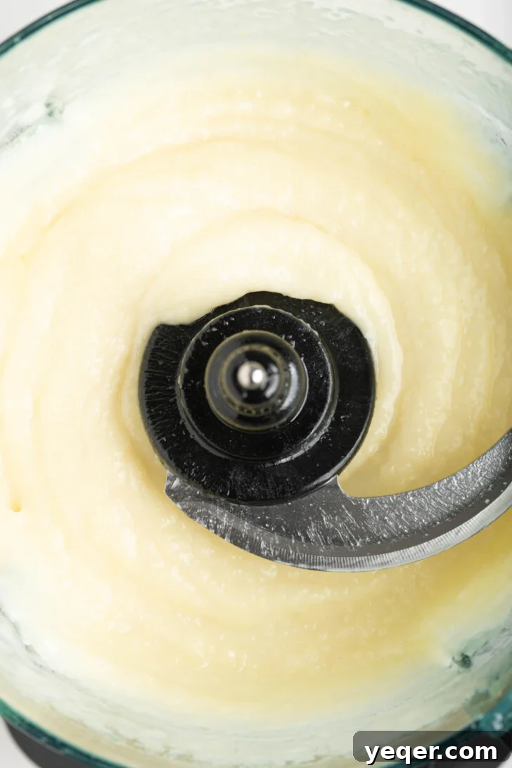 Fluffy 5-Ingredient Garlic Toum 5 a food processor with garlic sauce