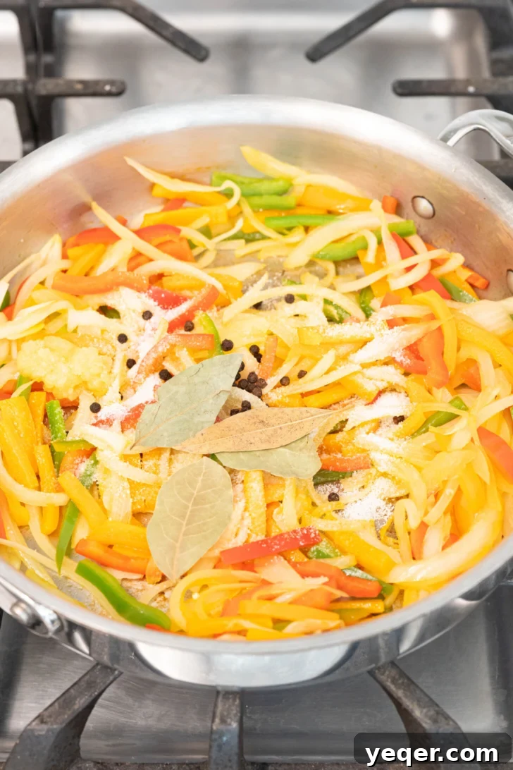 Green Banana Escabeche 9 onions and peppers in a pan