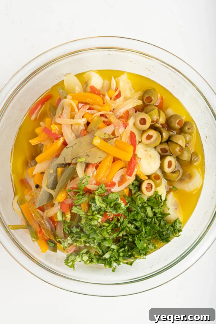 Green Banana Escabeche 10 a bowl of bananas with escabeche