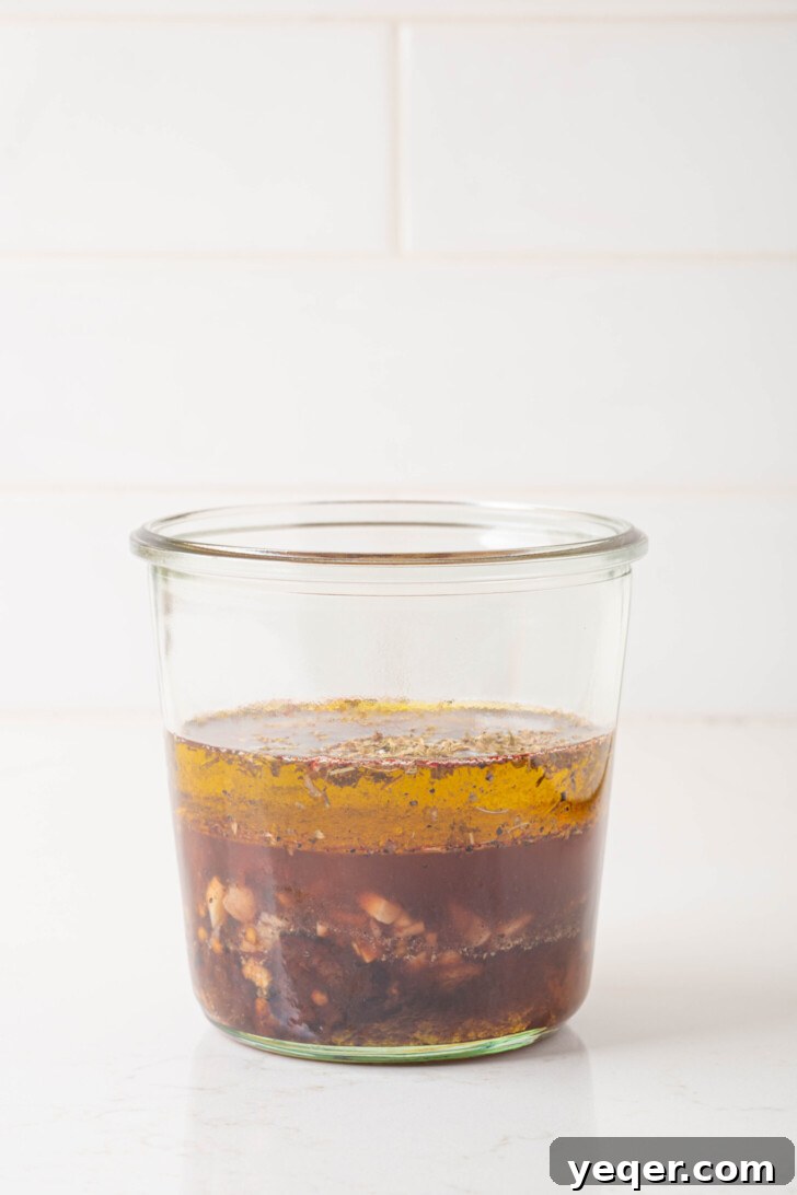Effortless Chipotle Vinaigrette 5 All ingredients for chipotle vinaigrette combined in a wide-mouthed jar, ready for blending.