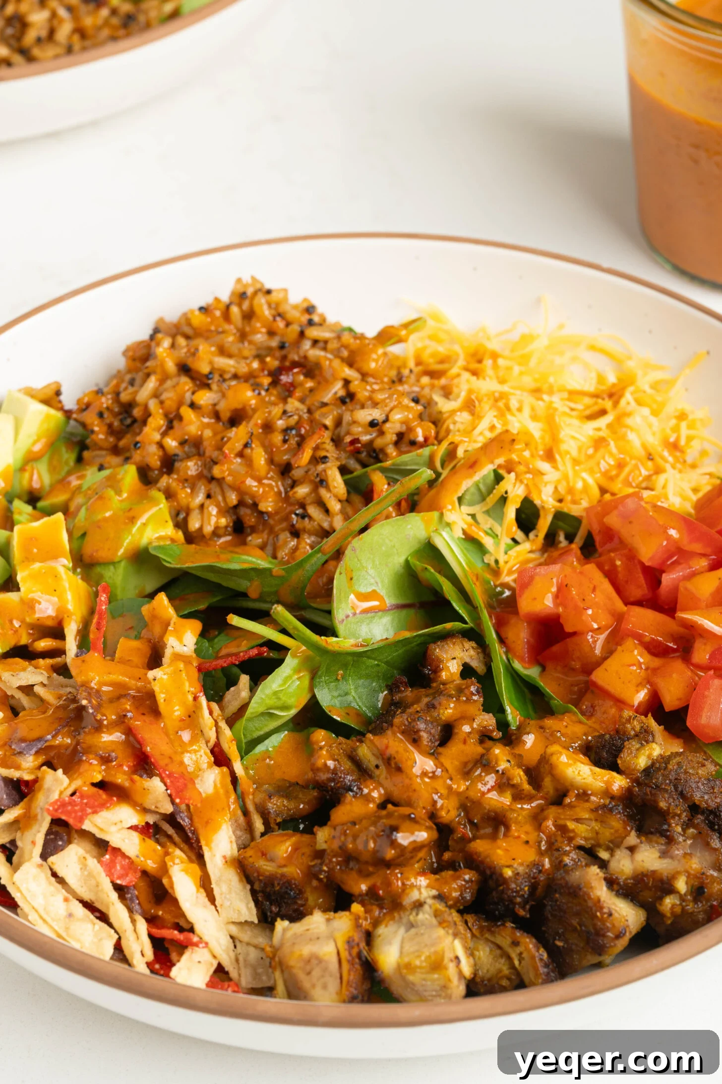 Effortless Chipotle Vinaigrette 9 Chipotle dressed burrito bowls with corn, beans, rice, and fresh toppings.