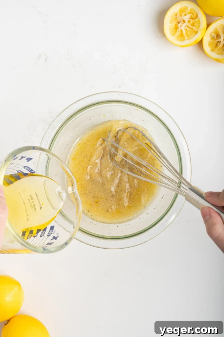 Speedy Gourmet Lemon Vinaigrette 5 lemon vinaigrette whisking in a bowl