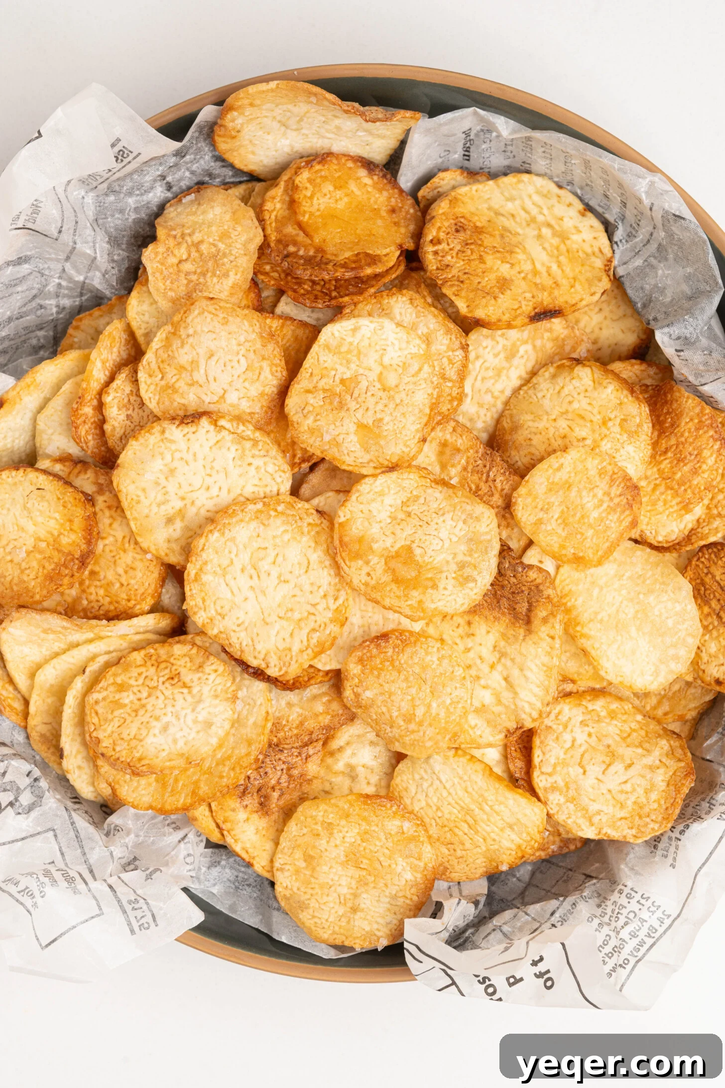 Crispy Taro Chips 30 Minutes Oven and Air Fryer 15 A inviting bowl of crispy homemade taro chips, perfectly seasoned and ready for serving.