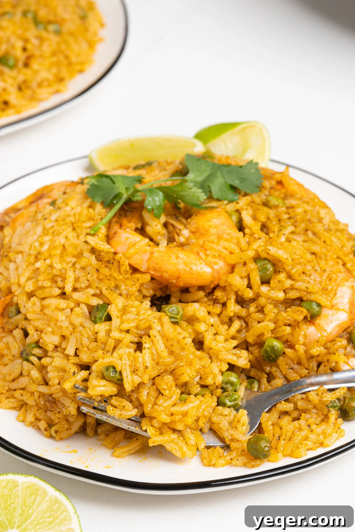Vibrant Puerto Rican Arroz con Camarones 12 A beautifully plated dish of Arroz con Camarones, highlighting its vibrant colors and textures.