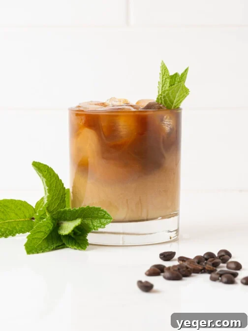 A coffee mint mojito in a glass.