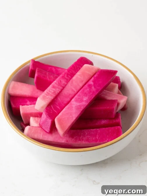 A bowl of pickled turnips.