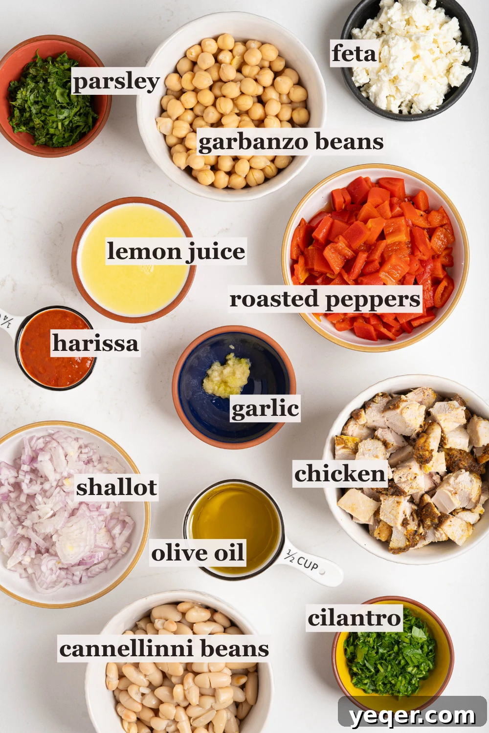 Golden Roast Chicken & Bean Feast 3 Bowls filled with individual ingredients for Moroccan bean salad, including cooked chicken, feta cheese, various beans, and fresh herbs.