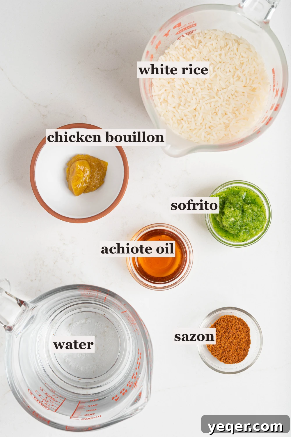 Fluffy 30-Minute Yellow Rice 4 Bowls of essential ingredients for Arroz Amarillo including rice, oil, sofrito, and seasonings.