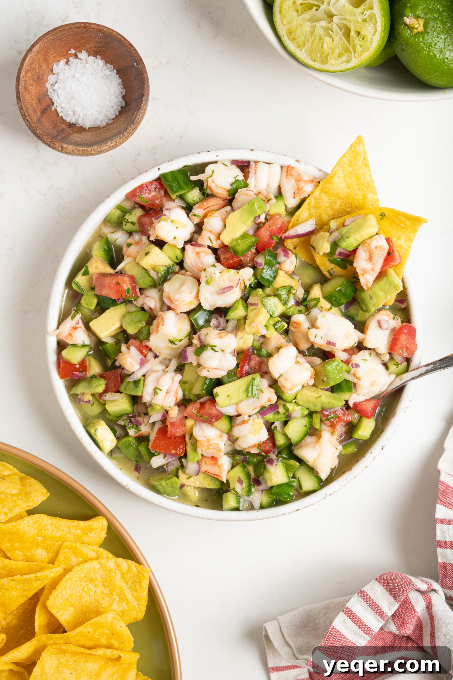 Fresh and Zesty Shrimp Ceviche 3 Close-up of shrimp ceviche in a bowl, with a spoon.
