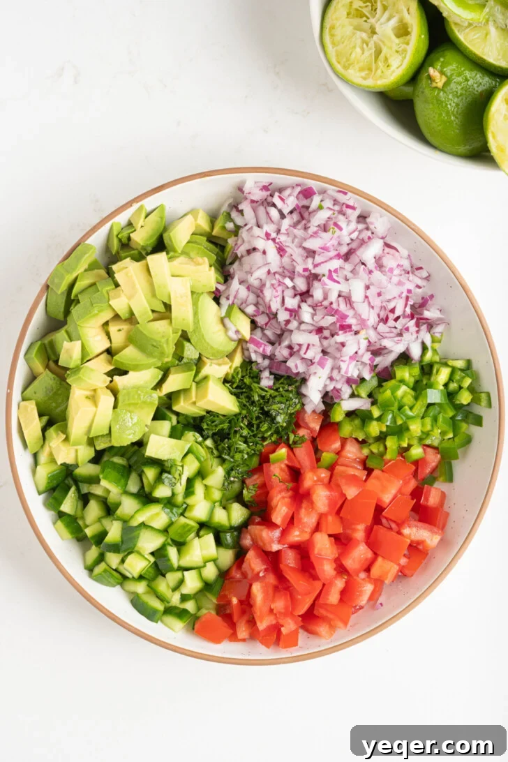 Fresh and Zesty Shrimp Ceviche 6 Chopped veggies in a bowl.