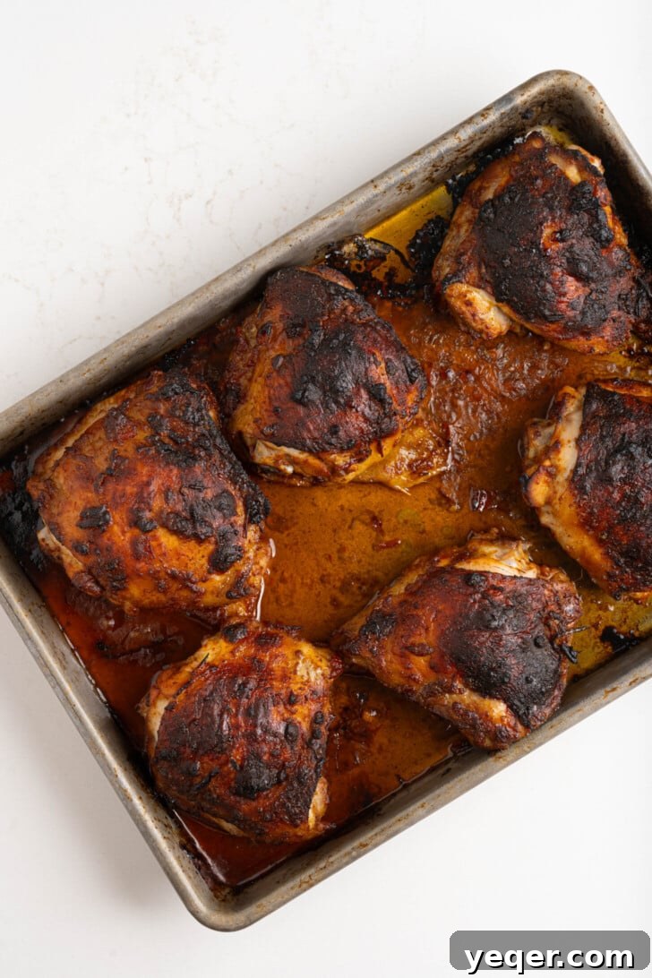 Spicy Sweet Harissa Honey Chicken 6 Roasted harissa honey chicken in a pan.