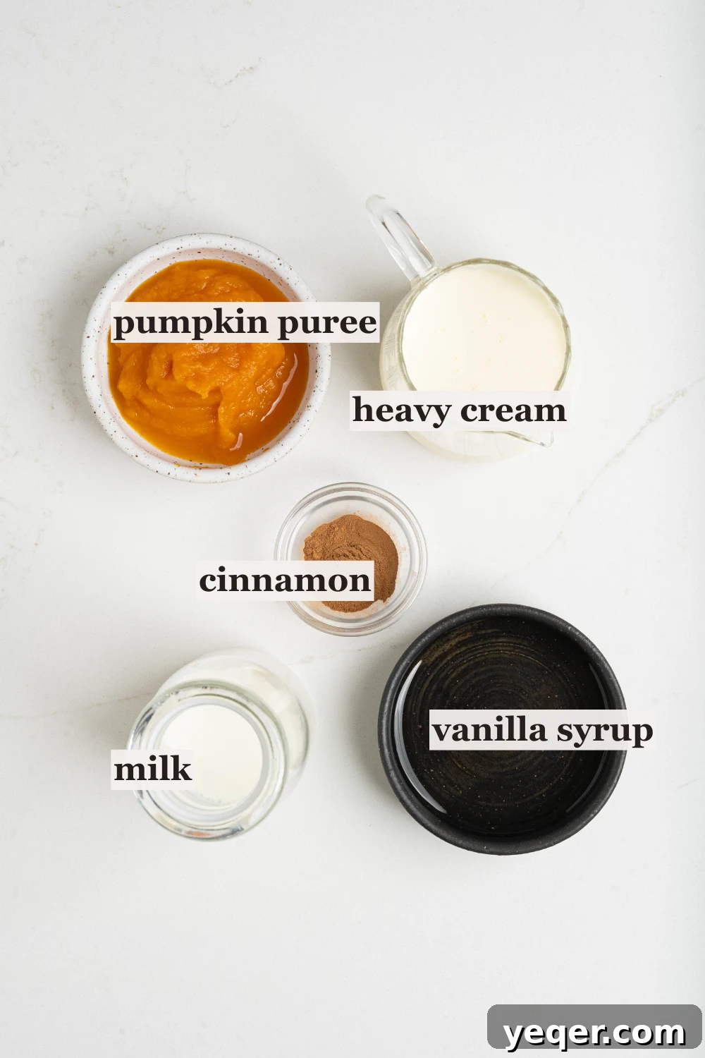 Homemade Five-Ingredient Pumpkin Spice Cold Foam 4 Bowls of pumpkin puree, cream, and more ingredients for cold foam.