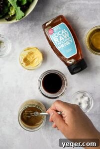 Signature Balsamic Vinaigrette 4 Mixing together ingredients for a classic balsamic vinaigrette.