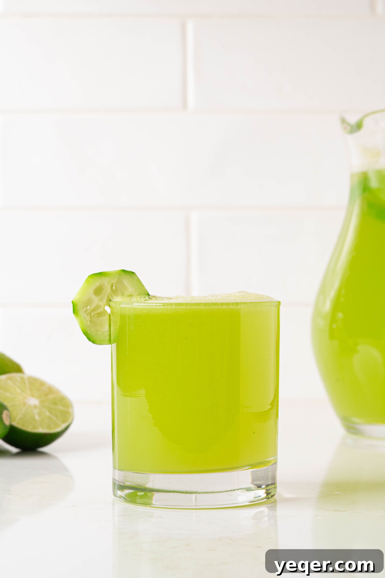 Cool Cucumber Lime Refresher 8 A refreshing glass of agua de pepino, garnished with cucumber and lime slices, ready to be enjoyed.
