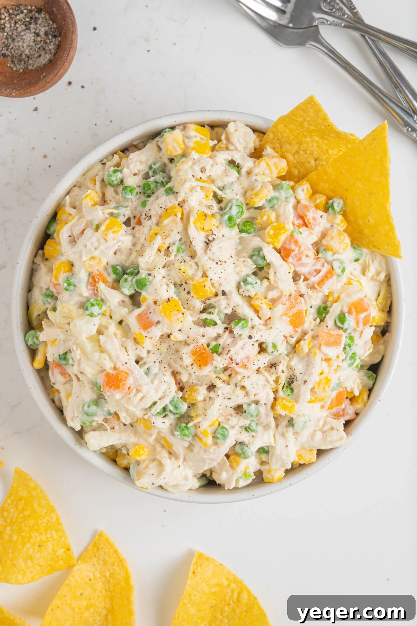 Fiesta Chicken Salad 8 A vibrant bowl of Ensalada de Pollo, ready to be served, showcasing all the colorful ingredients.