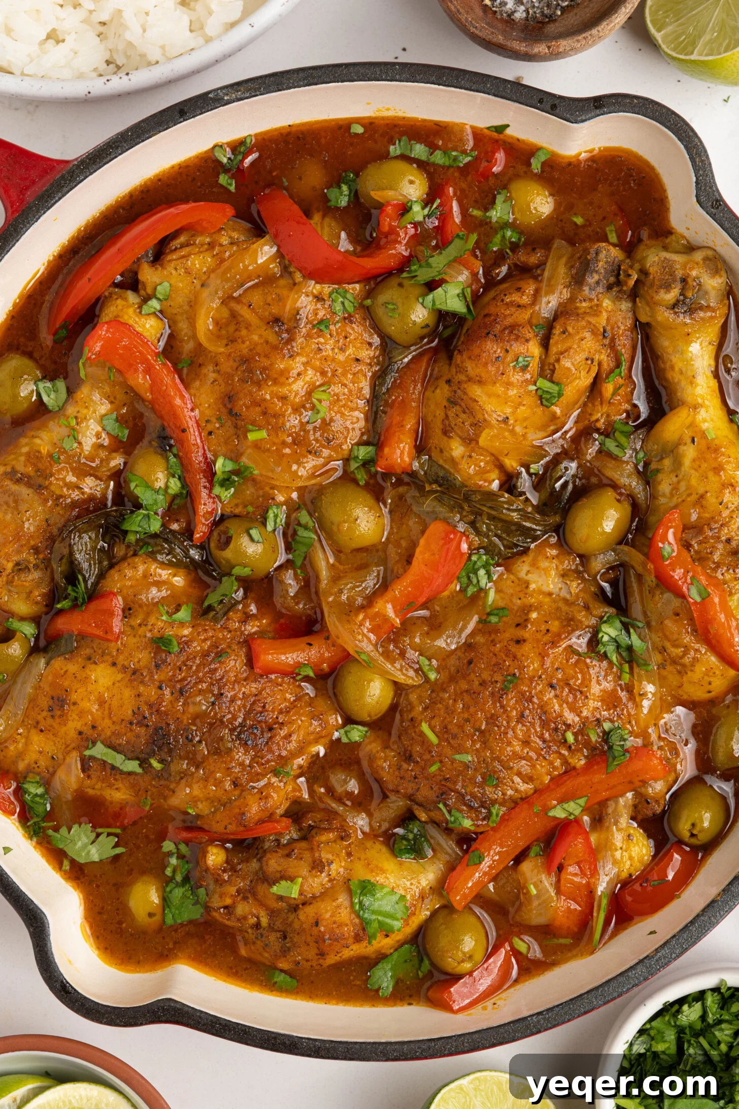 One-Pot Wonder Chicken Stew 2 A large pot filled with rich, savory Pollo Guisado, showcasing tender chicken pieces and a vibrant sauce, ready to be served.