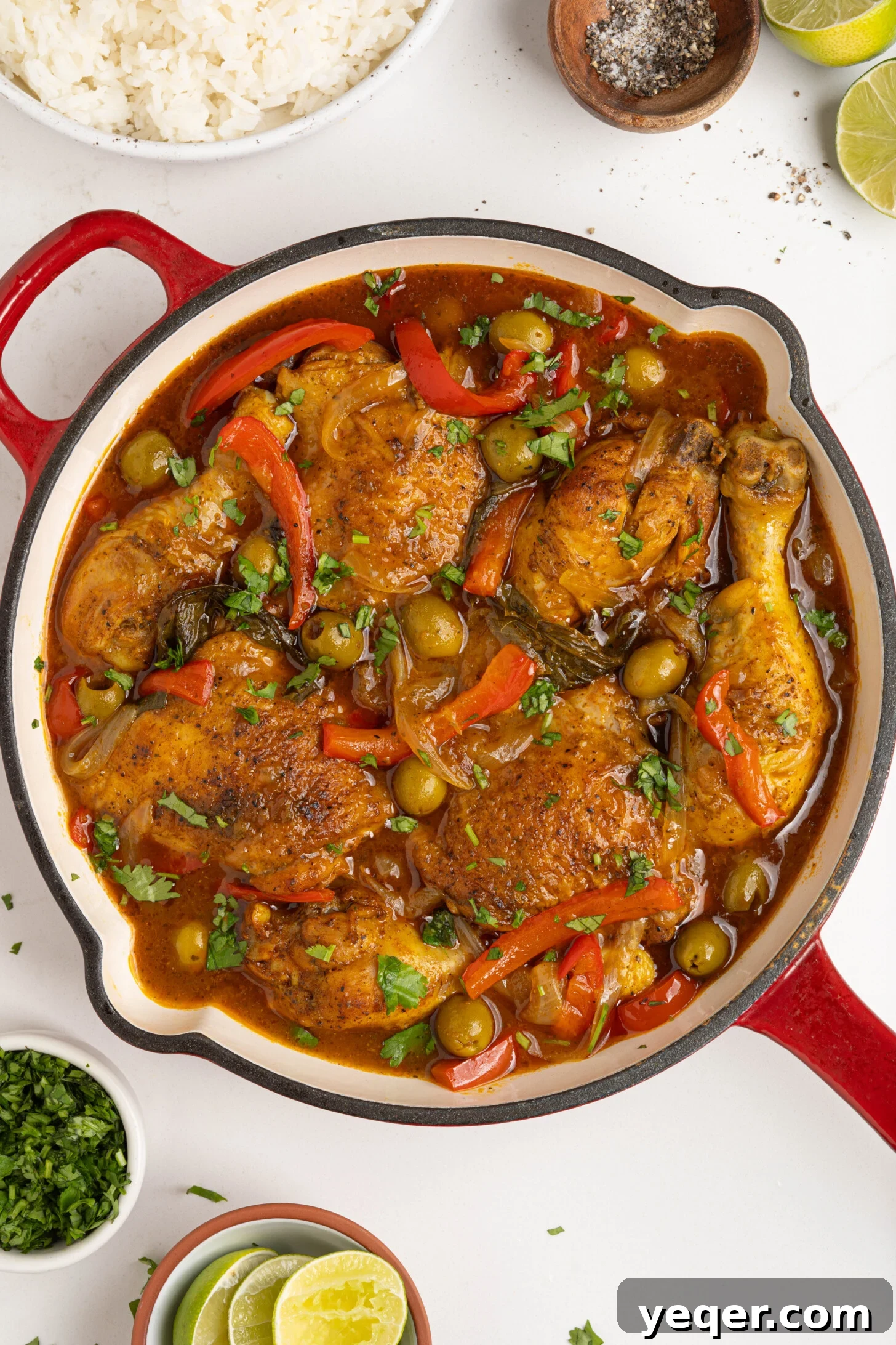 One-Pot Wonder Chicken Stew 3 Close-up of Pollo Guisado simmering in a pot, highlighting the rich broth, tender chicken, and colorful vegetables.