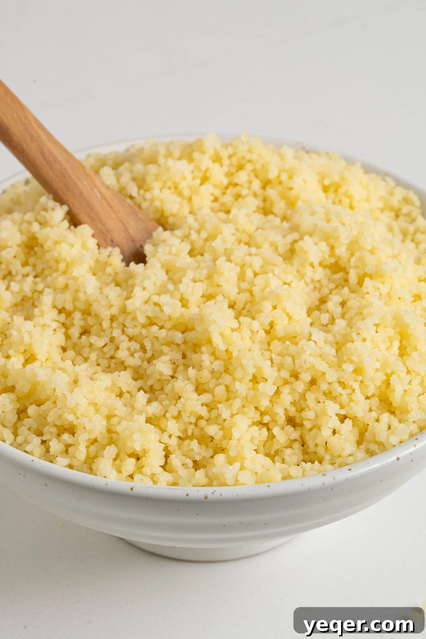 The Secret to Perfectly Fluffy Couscous 2 A beautifully presented bowl of fluffy couscous, ready to be served.