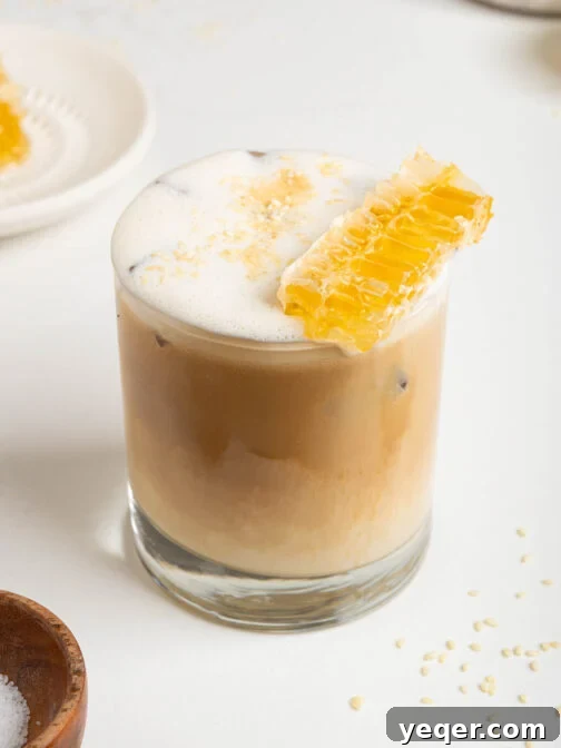 A tahini latte in a glass.
