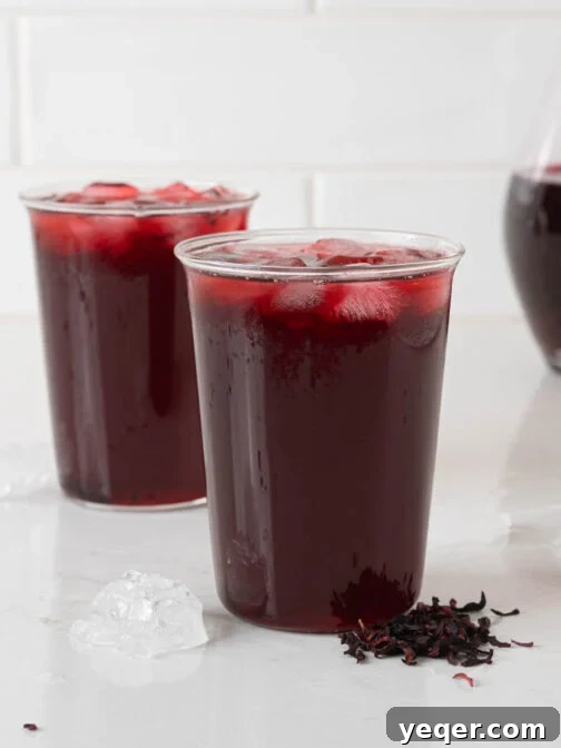 Glasses of agua de jamaica.