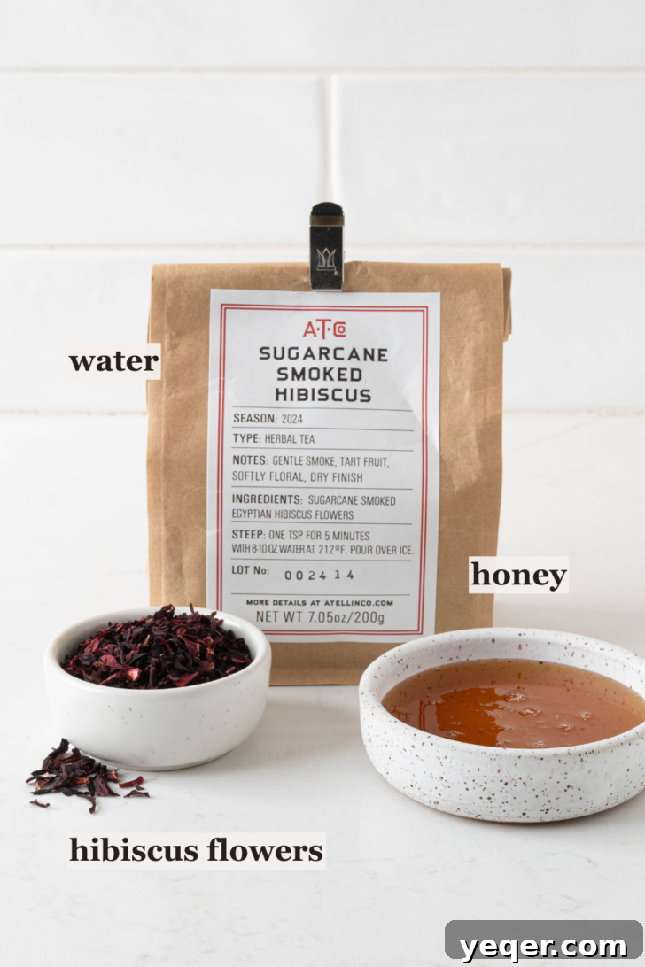 Bowls of hibiscus flowers and honey.