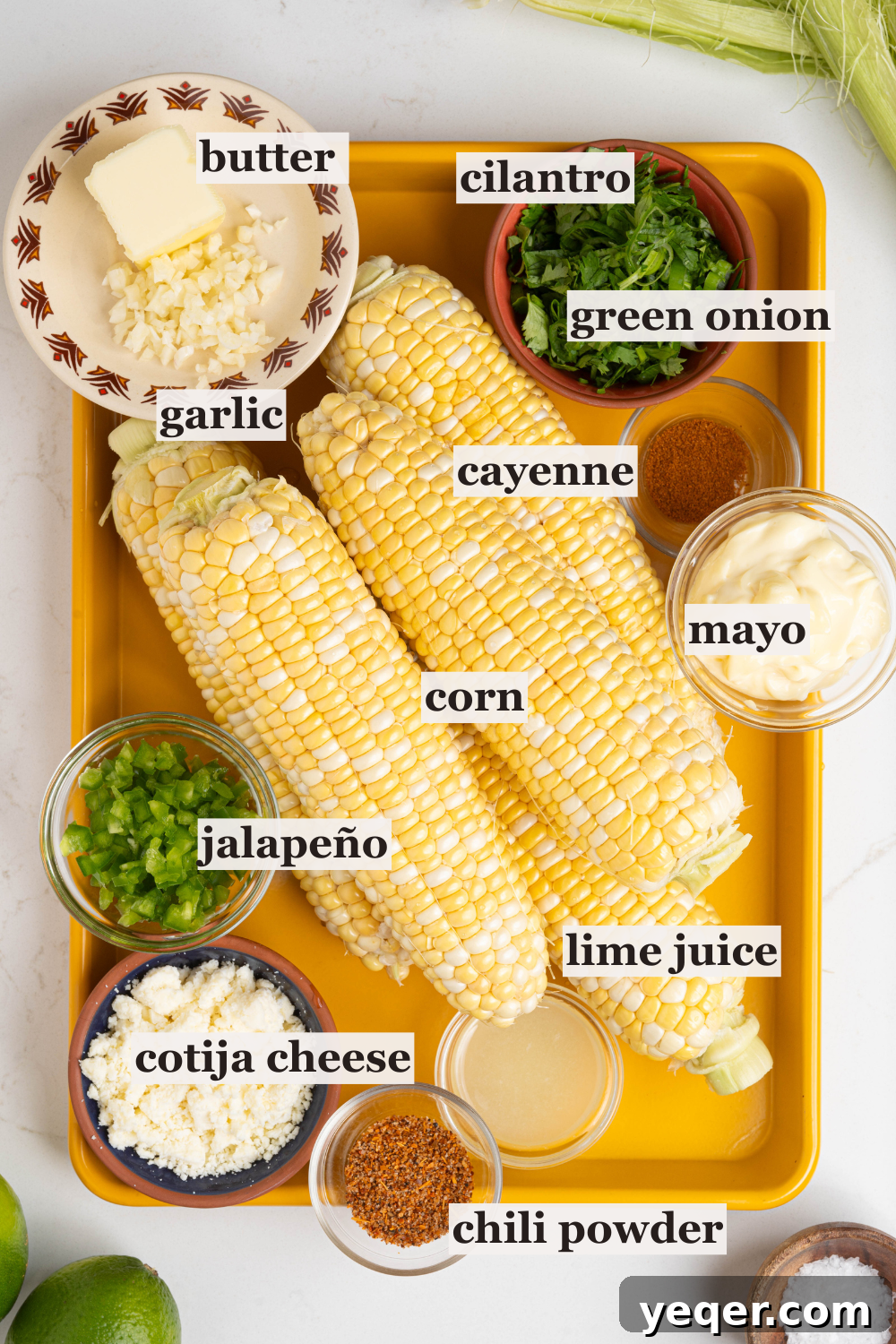 Grilled Mexican Street Corn Dip 4 Bowls of fresh ingredients for Elote Dip including corn, herbs, mayonnaise, cotija cheese, and spices.