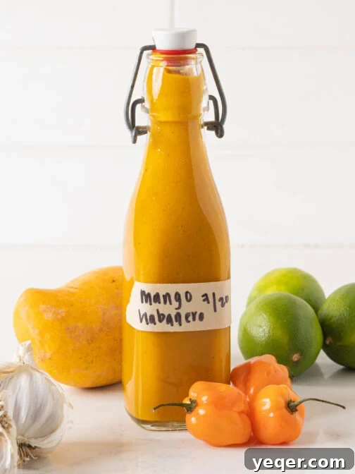 A bottle of mango habanero hot sauce.