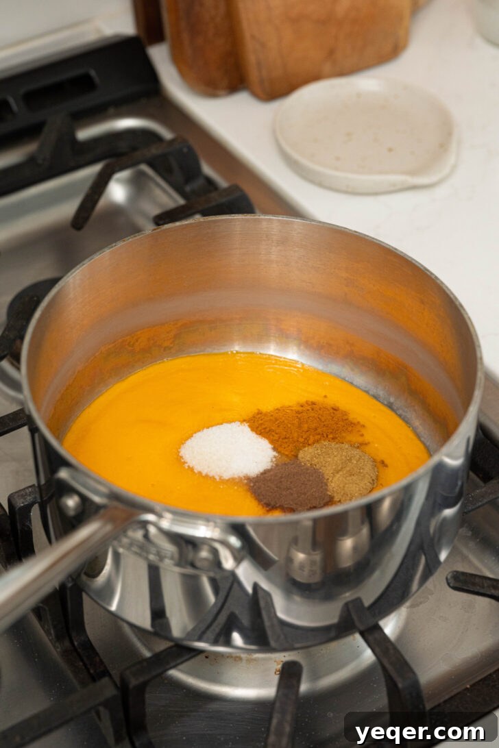 Tropical Fire Mango Habanero Sauce 7 Spices and mango habanero hot sauce in a pot.
