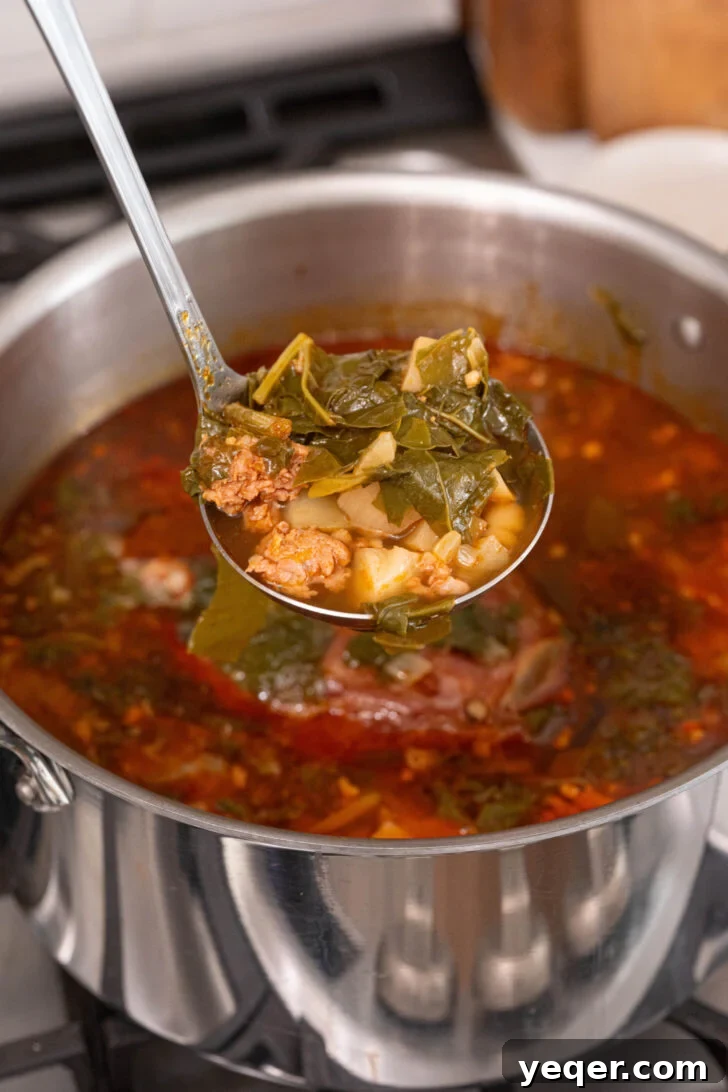 Hearty Galician White Bean Chorizo and Ham Caldo 8 A finished pot of Caldo Gallego, rich and steaming, ready to be served.