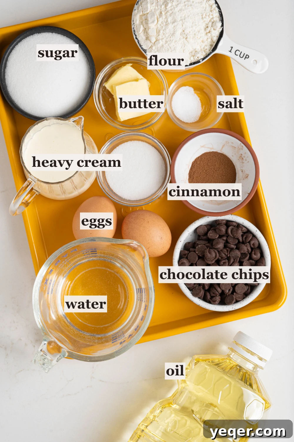 Homemade Golden Churros with Decadent Chocolate Sauce 4 Bowls filled with key ingredients like flour, sugar, cinnamon, and cream, neatly arranged.