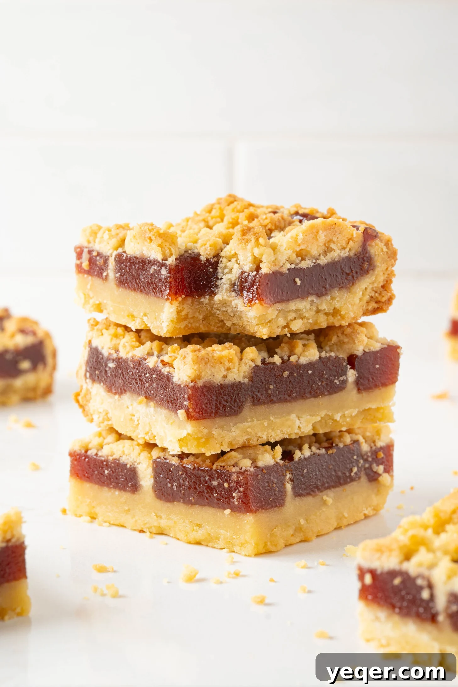 Golden Guava Crumble Bars 10 More freshly baked guava bars arranged beautifully, emphasizing their golden-brown topping.