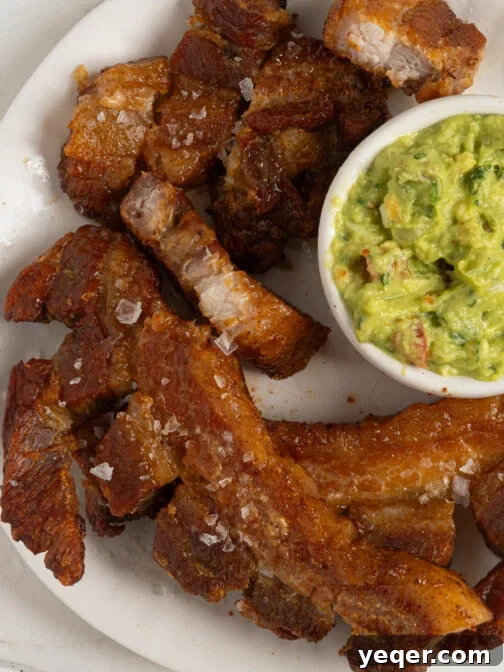 Crispy chicharrones on a plate.
