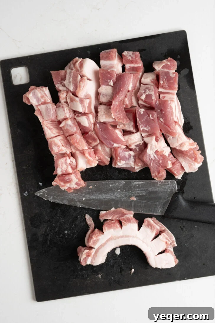 Crackling Oven-Roasted Pork Belly 3 Pork belly cut into strips with the skin scored.