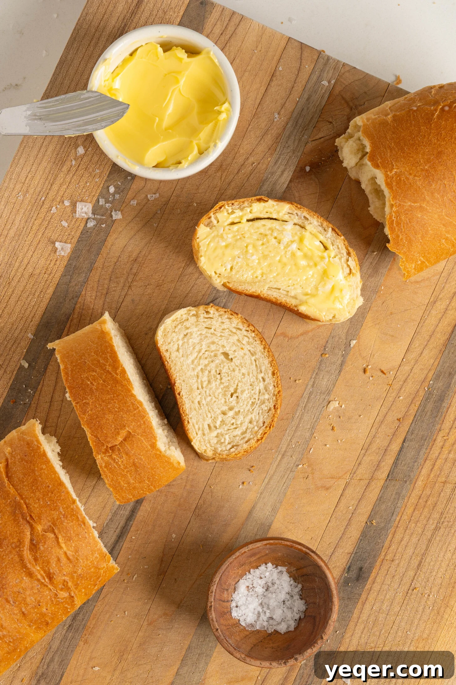 Pan Sobao Puerto Rican Soft Sweet Bread 11 A cutting board with more sliced pan sobao, inviting to be eaten.